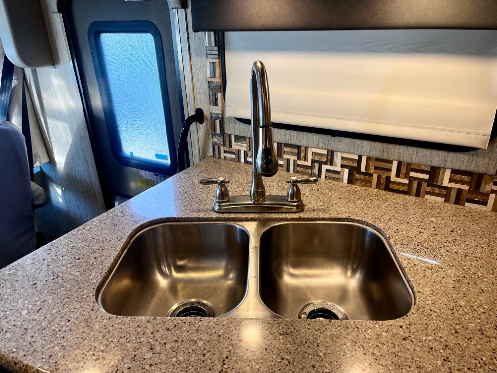 Explore the Comforts of the Open Road: Coachmen Mirada 35BH Luxury Class A RV Rental w/ 2 bathrooms