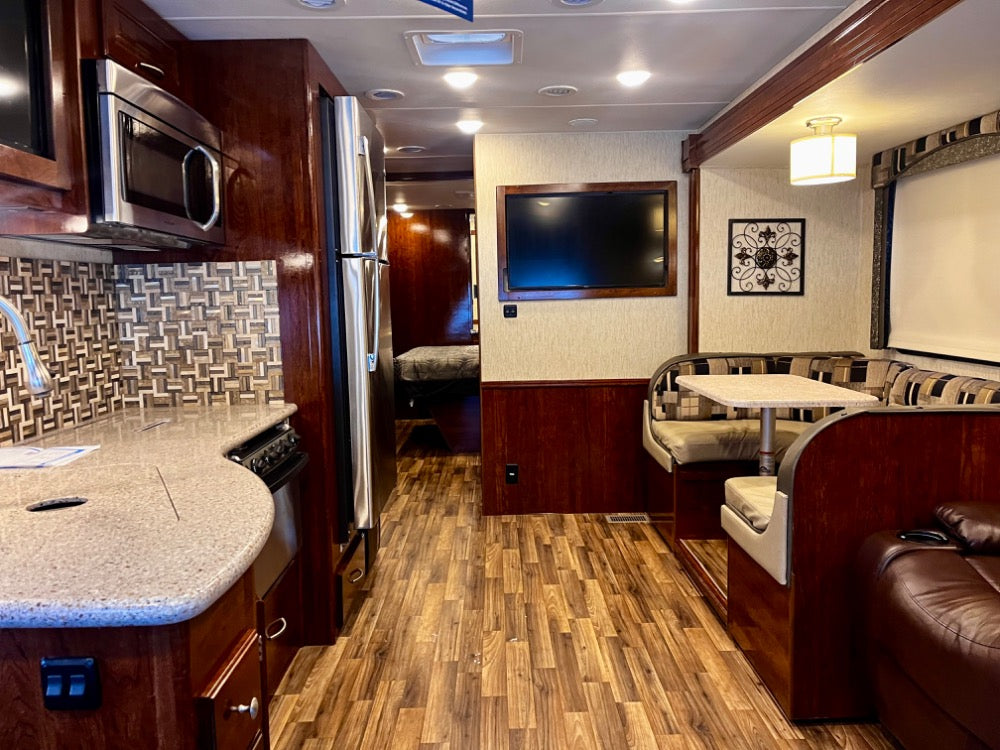 Explore the Comforts of the Open Road: Coachmen Mirada 35BH Luxury Class A RV Rental w/ 2 bathrooms