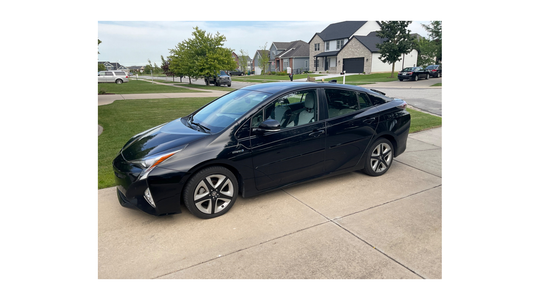 Experience Efficiency and Comfort: Rent the 2017 Toyota Prius Four Touring